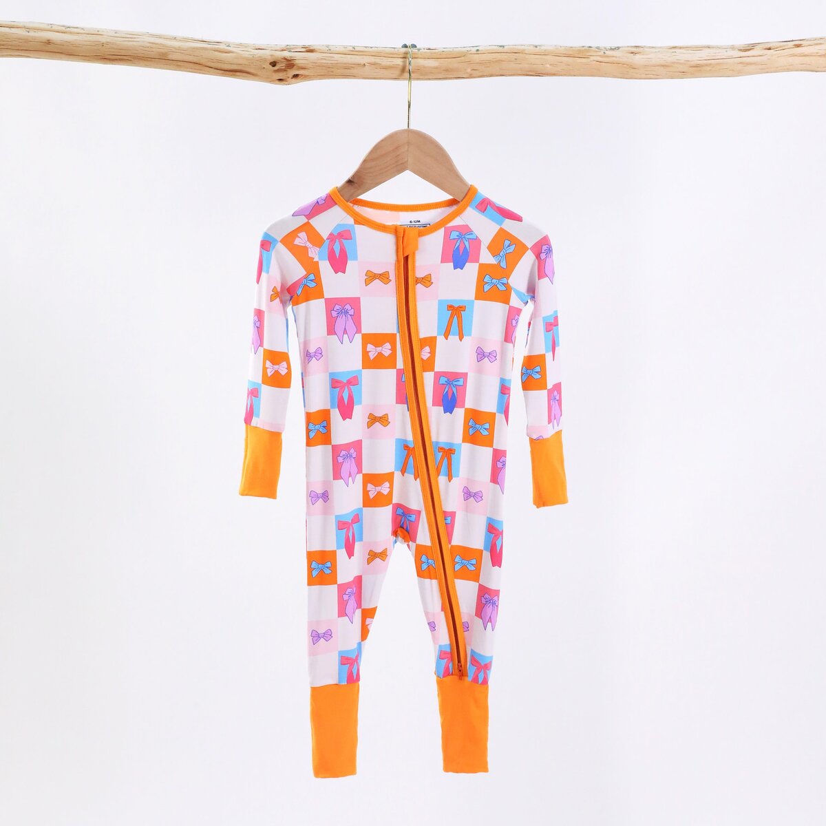 GOTS certified bamboo onesie showcasing sustainable clothing options, perfect for eco-conscious retailers seeking premium quality apparel.
